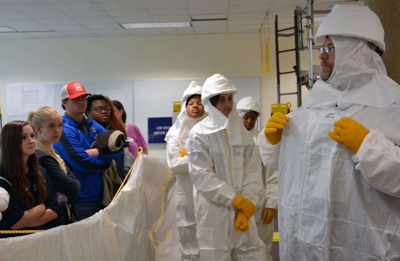 Students learn how to dress out when entering the plant to work. 